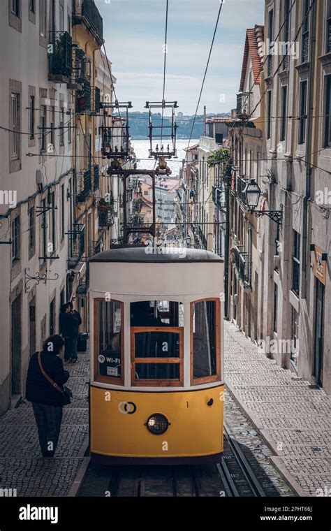 Old tram through the streets of beautiful Lisbon Stock Photo - Alamy