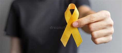 Childhood Cancer Awareness, Yellow Ribbon with Stethoscope for Supporting People Living Stock ...