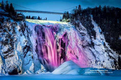 Illuminated ice under the Chute-Montmorency falls - Martin Labbé