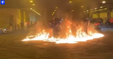 After street racers do stunts on Lower Wacker Drive with spectators in ...