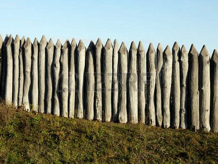 wooden palisade of the protective fence of an ancient fortress Stock ...