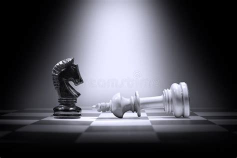 White King Chess Piece Defeating by Black Knight Chess Piece Stock Photo - Image of intelligence ...