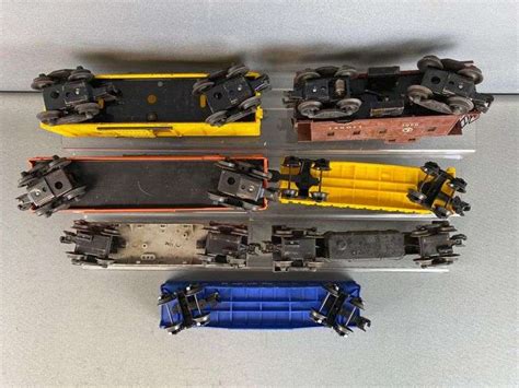 Group of 7 Assorted Lionel O Scale Train Cars - Matthew Bullock Auctioneers