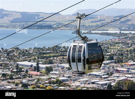 Skyline Gondola cable car cableway ride to peak at Rotorua,with views of Rotorua Lake and town ...