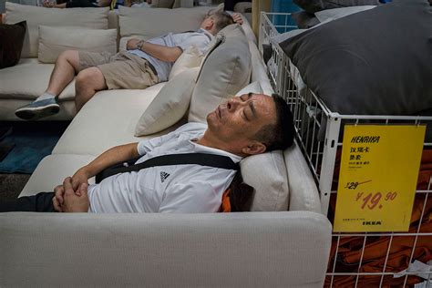 Photos of Shoppers Sleeping on Beds and Sofas in Ikea Stores in China