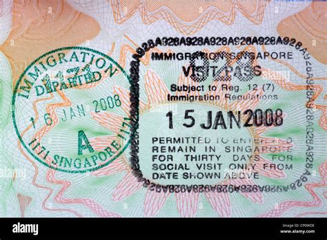 Immigration stamps for Singapore in British passport Stock Photo - Alamy