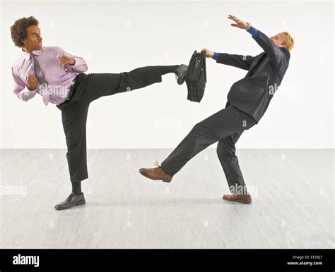 Two business people fighting Stock Photo, Royalty Free Image: 78123759 ...