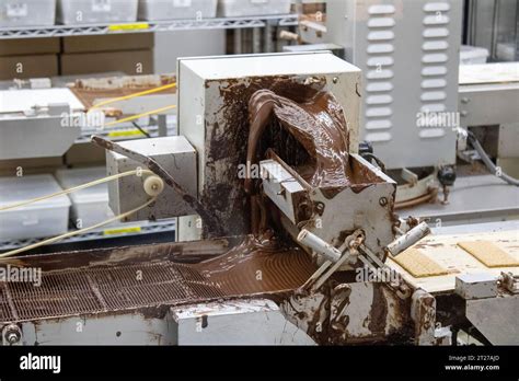 chocolate factory machine Stock Photo - Alamy