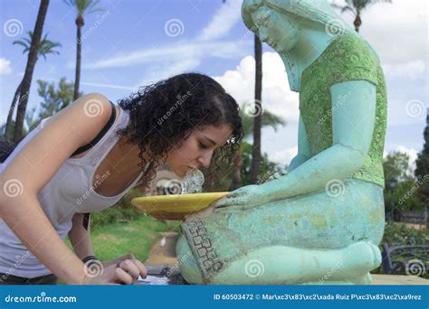 Young Woman Drinking Water from a Fountain Stock Photo - Image of diet, mouth: 60503472