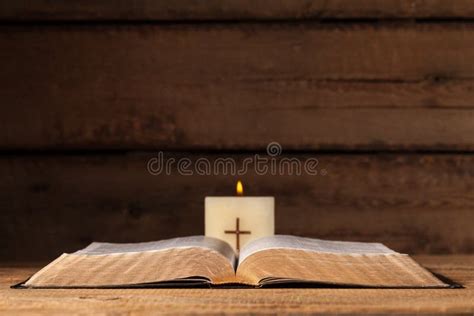 Open Bible With Candle