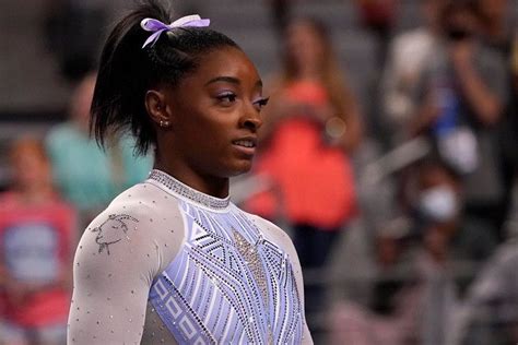 Simone Biles Says She Wears a Goat on Leotard to 'Hit Back at the ...