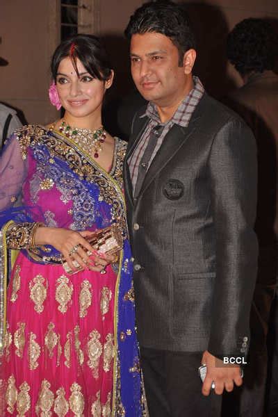 Bhushan Kumar with wife Divya at Dheeraj Deshmukh and Honey's wedding reception, held in Mumbai.