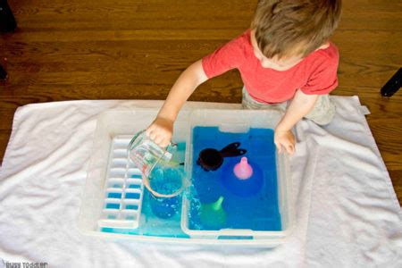 5 Things Kids Learn from Pouring Water - Busy Toddler