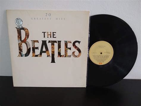 20 Greatest Hits: Beatles, the: Amazon.it: CD e Vinili}