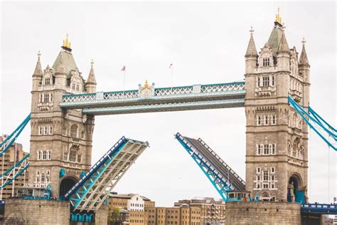 Tower Bridge in London with drawbridge open — Stock Photo © william87 ...