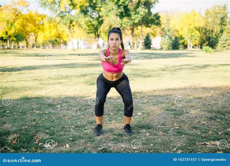 Outdoor Squat Workout of a Fit Young Woman Stock Image - Image of cute, healthy: 162731157