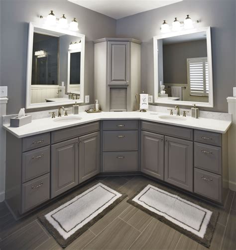 This large corner vanity has striking features with double mirrors and sinks, beautiful cabine ...