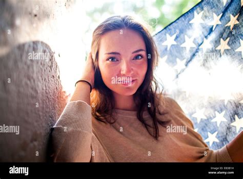 Caucasian woman holding American flag outdoors Stock Photo - Alamy