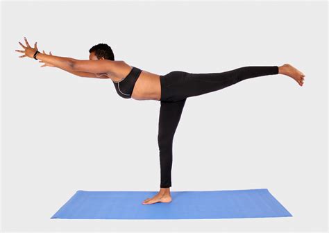 Young woman doing balance yoga pose