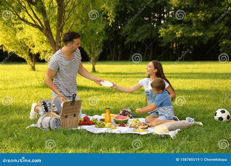 Happy Family Having Picnic in Park on Summer Day Stock Image - Image of ...