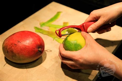 Haden Mango, FREE Stock Photo, Image, Picture: Peeling Mangoes, Royalty-Free Fruit Stock Photography