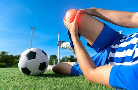 Premium Photo | Football soccer player accident knee injury sport ...