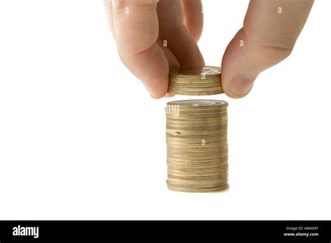 Hand holding coins Stock Photo - Alamy