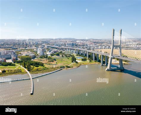 Aerial View Of Vasco da Gama Bridge And High Car Traffic In Lisbon City Of Portugal Stock Photo ...