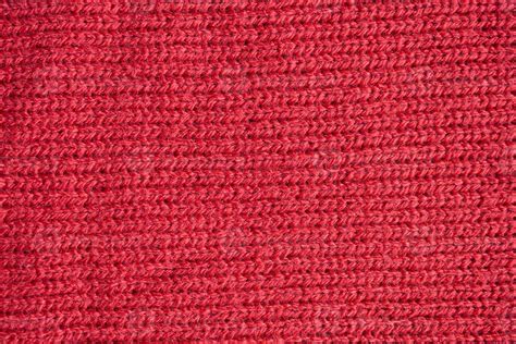 Red knitted wool fabric texture background 12603367 Stock Photo at Vecteezy