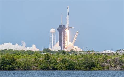 Closer than humanly possible: New launch pad photos capture historic SpaceX liftoff in all its ...