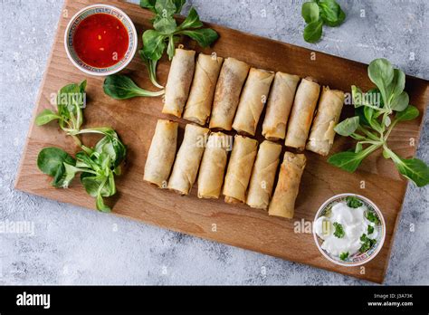 Fried spring rolls with sauce Stock Photo - Alamy