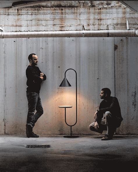 slender black metal forms the 'ozz' lamp collection by paolo cappello + simone sabatti in 2021 ...