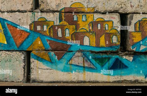 A Palestinian Artist Graffiti .. Gaza Harbor Cement Blocks Wall Stock ...