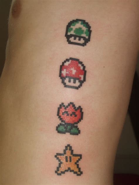 Get Powered Up With These 28 Amazing Super Mario Tattoos | Super mario tattoo, Mario tattoo ...