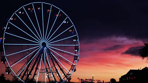 Ferris wheel 4K Wallpaper, Silhouette, Sunset, Neon Lights, Amusement park, Purple sky ...