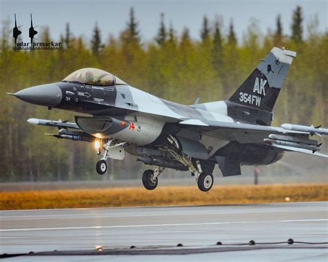 354th Wing F-16C Viper in Arctic camo of the 18th Aggressor Squadron taking off during a Red ...