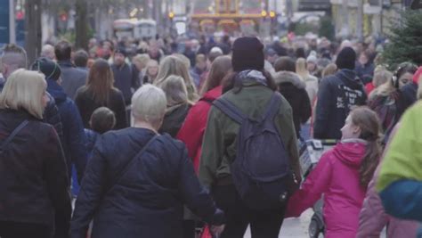 the bustling city crowd, from Scotland, Our New Home: The documentary... | Download Scientific ...