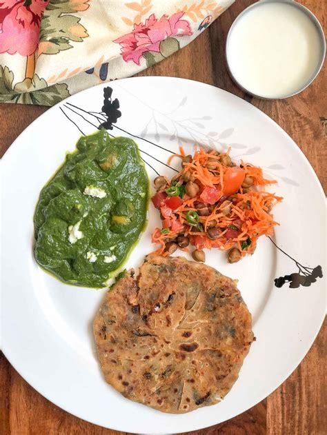 Here's Simple North Indian Dinner - Palak Mushroom, Pyaaz Ka Paratha, Curd & Salad by Archana's ...