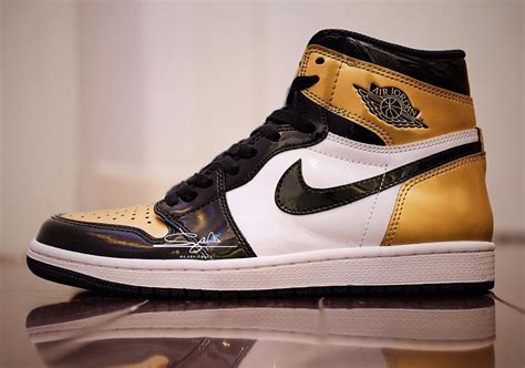 Air Jordan 1 Retro High OG "Gold Toe" Adult + Kids Sizes | SneakerNews.com