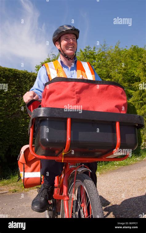 English postman uniform hi-res stock photography and images - Alamy