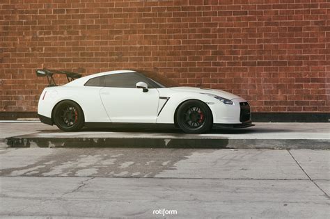 Streat Weapon - Nissan GT-R Fitted With Rotiform Rims and Massive Wing Spoiler — CARiD.com Gallery