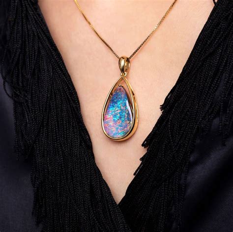 Magic Moment - Australian Boulder Opal Pendant in 18K Yellow Gold