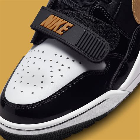 Jordan Legacy 312 Low Black Gold CD7060-071 | SneakerNews.com