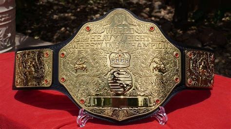 Why does the new World Heavyweight Championship have the WWE logo in ...