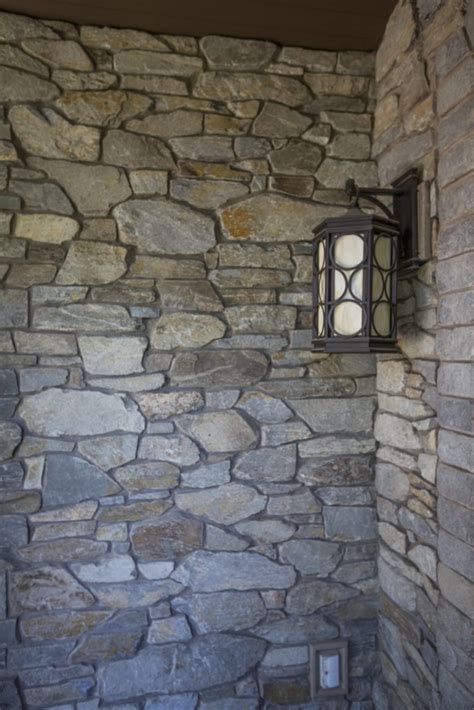 Exterior Stone Wall with Rustic Light Fixture