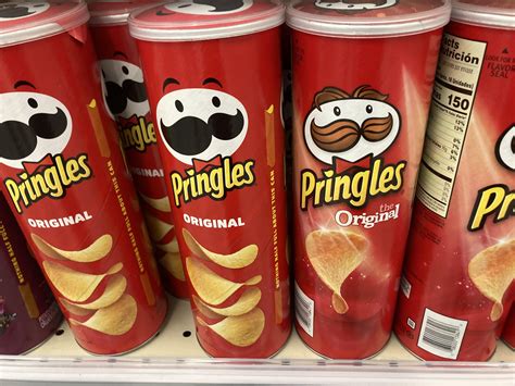 a comparison between the old pringles logo and the new one : r ...