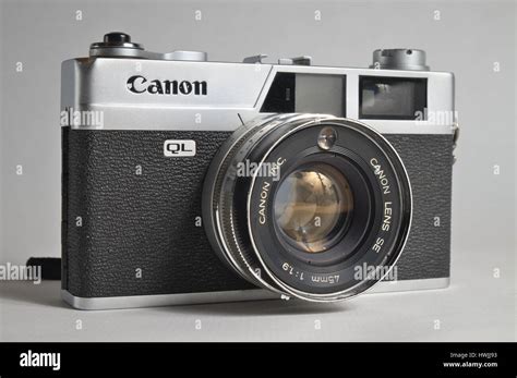 Old Canon analogue camera, model Canonet QL19. 35mm film compact camera, with 45mm Canon lens ...