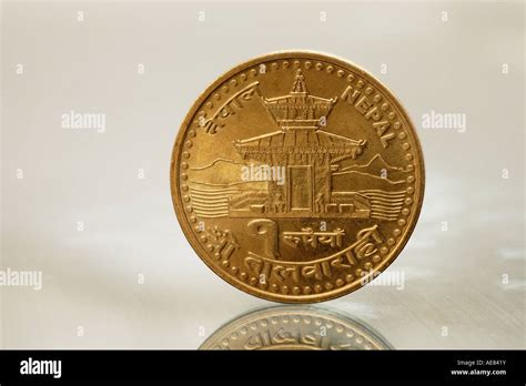 Nepalese one-rupee coin Stock Photo - Alamy