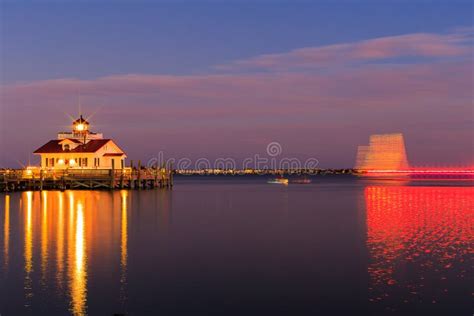 Manteo Lighthouse NC at Christmas Time Celebration Editorial Image - Image of sunset, lights ...