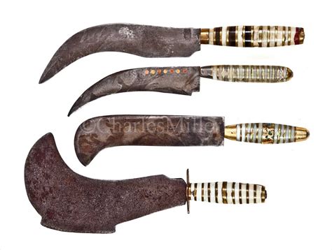 Lot 116 - FOUR 19TH-CENTURY ?FLENSING KNIVES with